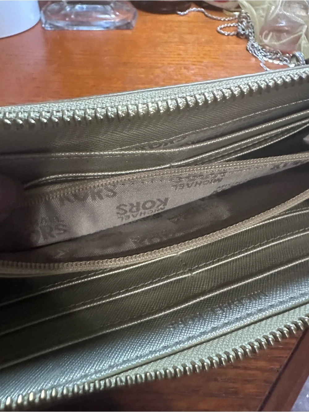 Michael Kors Metallic Gold MK Logo Zip Around Wallet GUC